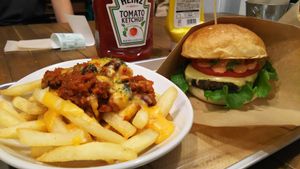 Chili fried potatoes with cheese, and cheese burger. at Ain Soph.Ripple Kabukicho in Tokyo