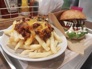 Chilli-cheese fries and falafel burger at Ain Soph.Ripple Kabukicho in Tokyo