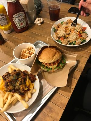 Chili cheese fries, waffle, cheeseburger, quinoa salad at Ain Soph.Ripple Kabukicho in Tokyo