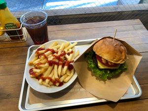 Ripple cheese burger, fries and iced tea. at Ain Soph.Ripple Kabukicho in Tokyo