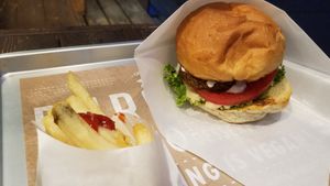 Falafel burger and fries at Ain Soph.Ripple Kabukicho in Tokyo