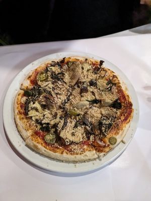 Pizza with cashew parmesan at Ottimo Ristorante Italiano in Hobart