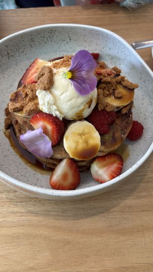 Buckwheat pancakes with banana, biscoff and berries  at Island Whole Foods in Cowes