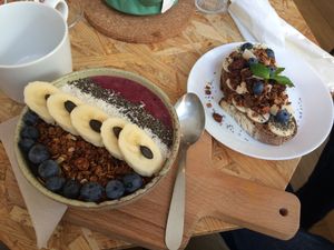 Acai bowl & energy tartine - both delicious! at Paper Plane in Nice