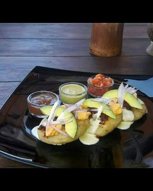 Gorditas de Frijol con Chorizo de Garbanzo,Queso de Almendra y Crema de Nuez de la India at Mito  in Zihuatanejo