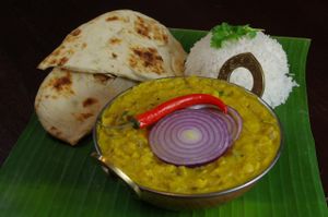 Dal Fry: Stew from Toor Dal (split pigeon peas), onions, garlic, and ginger. Vegan. at Dabbawalas in Basel