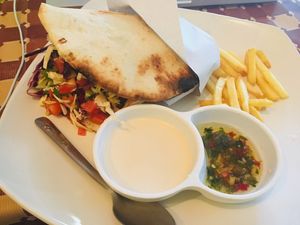 The falafel sandwich (it comes with more fries, I just took this pic after having eaten some) at Gallery House of Hummus in Koh Phangan