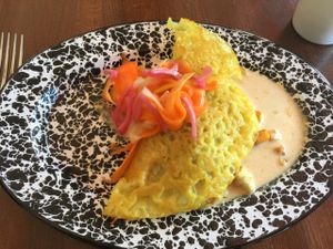 Roasted Veggie Crepe: turmeric-coconut crepe, roasted hearty vegetables, with panang curry sauce.  at Veg Cafe in Sacramento