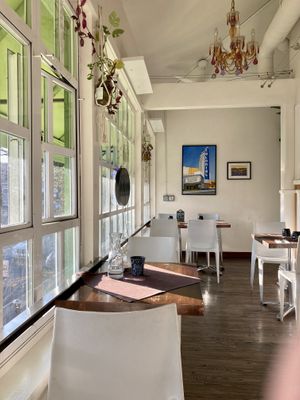 Part of the enclosed porch seating area  at Veg Cafe in Sacramento