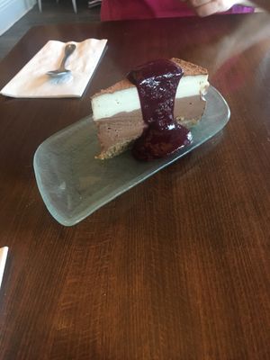 Vegan tiramisu cheesecake with blackberry sauce at Veg Cafe in Sacramento
