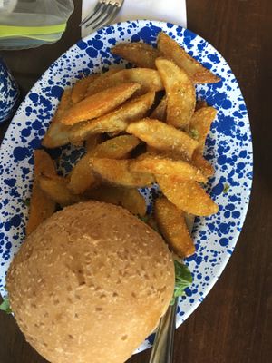 Beyond burger with potato wedges at Veg Cafe in Sacramento