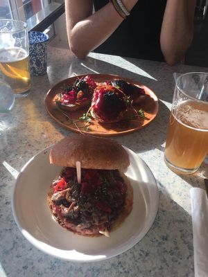 Lunch: Beet and "caviar” crostini and an Asian-style beyond burger with a great selection of IPAs. Yum!!!!!  at Veg Cafe in Sacramento