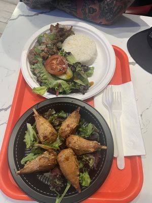 Chicken wings (bottom) spare ribs (top)  at Nibi Pho Bistro in Commerce