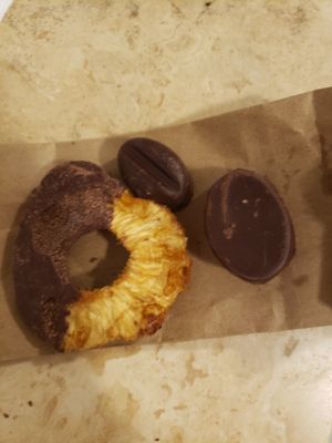 Chocolate dipped dried pineapple, coffee bonbon, peanut butter bonbon at Chocolate Fusion Cafe in La Fortuna