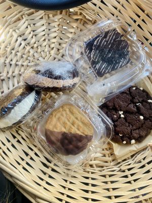 classic whoopie pie, chocolate whoopie pie, peanut butter sandwich dipped in chocolate, cookies & cream brownie, and double chocolate chip cookie 🤤🤤🤤  at Vegan Treats Bakery in Bethlehem