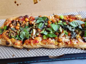 There's a fourth slice not shown in the pic.  Pretty good!! at IAD - &pizza - CC in Dulles