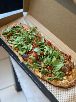 Veg. Mozzarella, veg. Sausage. Tomato, spinach and arugula  at IAD - &pizza - CC in Dulles