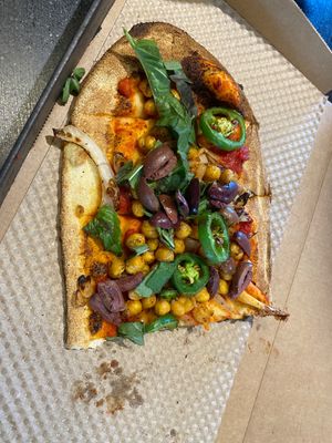 Not the best cut, but it’s tasty!  at IAD - &pizza - CC in Dulles