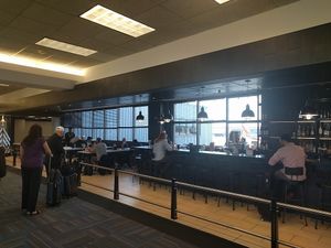 Bar and seating area at IAD - &pizza - CC in Dulles