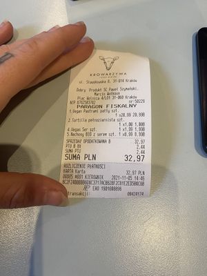 Receipt - 32,97 for a wrap and cheesy nachos  at Krowarzywa in Krakow
