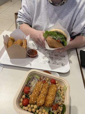 Chicken salad, Stripbox and beyond burger  at Krowarzywa in Krakow