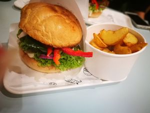 Seutan burger and fries at Krowarzywa in Krakow