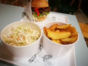 far back: millet burger; front: coleslaw and fries at Krowarzywa in Krakow