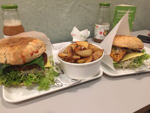 The chickpea burger the tofu burger and some Potato wedges at Krowarzywa in Krakow