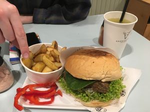 Seitan burger (I don’t like peppers so I picked them out) with tomato sauce and vegan mayo. Homemade lemonade in background at Krowarzywa in Krakow
