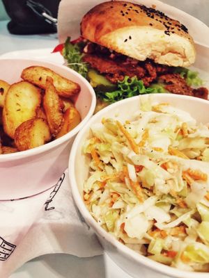 burger, wedges & coleslaw at Krowarzywa in Krakow