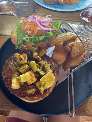 Bbq and pineapple falafel burger with extra grilled banana peppers   at Cafe Mono Congo in Dominical