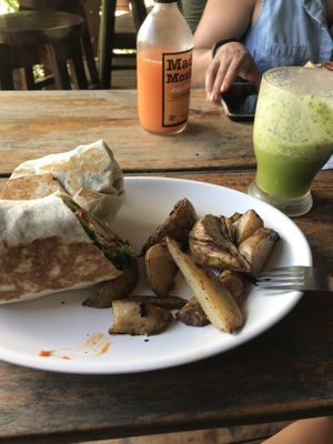 Falafel and hummus wrap with a kale and piña refresher  at Cafe Mono Congo in Dominical