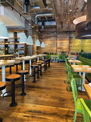 Beautiful interior, open space with lots of seating  at True Food Kitchen in El Segundo
