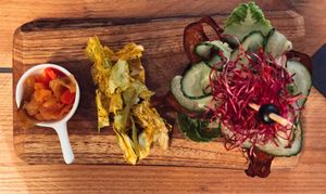 raw-vegan ";burger"; made with shii-take mushrooms, walnuts, sundried tomatoes & flax seed, served on a portobello mushroom with a side of cabbage chips & kimchi! at Zest for Life in Amsterdam