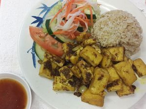***TOP 15 
Lemongrass Tofu  

Lemongrass, tofu, seasoned with tomato, lettuce, cucumber. at Loving Vegan Market & Cuisine in Winter Park