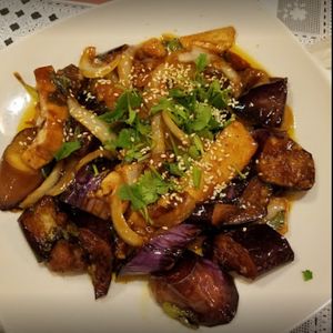 ***TOP 5 
Sesame Basil Eggplant  

Eggplant, sliced tofu, basil, onions, sesame seeds in  vegan oyster sauce. at Loving Vegan Market & Cuisine in Winter Park