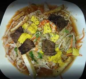 ***TOP 10 
Pad Thai  

Rice noodles, vegetable protein, tofu, vegan egg, vegan shrimps, carrots, bean sprouts, topped with peanuts. at Loving Vegan Market & Cuisine in Winter Park