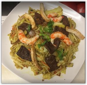 ***TOP 5  
Singapore Curry Noodles 

Thin rice noodles, soy proteins, fried tofu, Napa cabbage, carrots, vegan shrimps stir-fry with curry. at Loving Vegan Market & Cuisine in Winter Park