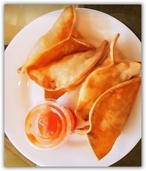 ***TOP 5 
Vegan Wings (4 wings) 

Deep fried.  

Soy protein, wheat protein, carrots, corn, chestnut. Served with ketchup. at Loving Vegan Market & Cuisine in Winter Park