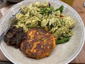 Sweet potato and kimchi fritter with onion jam and pesto pasta salad  at Let Them Eat - Central Market in Adelaide
