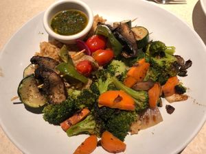 Veggie Kabobs over rice with side of roasted veggies! at Zoës Kitchen in Bluffton