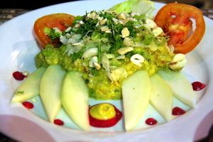 Guacamole salad with nuts (raw).  at The Mexican Kitchen in 
