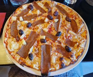 Pizza with vegan kebab, pineapple, and olives. No extra charge for vegan cheese. at Pizzeria Roihu in Joensuu