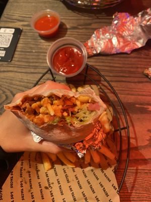 Vegan burrito with vegan cheese, mild salsa, mixed beans and salad. Medium salsa and tomato ketchup sauces. Plenty of options thought   at Los Tacos in Bergen