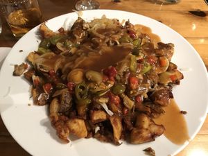 Extra large build your own poutine at Poutineville in Quebec