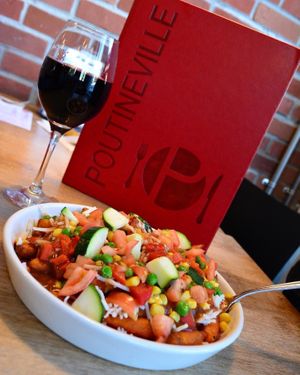 Veggie Poutine with vegan cheese at Poutineville in Quebec