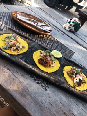 trio.. soyrizo & cheese, porkless cracklings, and creamy poblanos  at Charly's Vegan Tacos - Food Truck in Tulum
