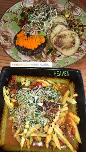 Noodle dish and burger  at Curcuma in El Chalten