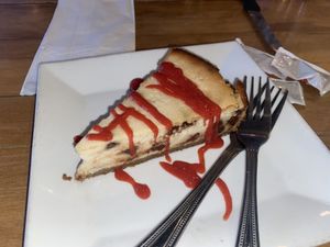 Cookie cheesecake w/ raspberry drizzle at Root in Lancaster