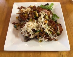 Crispy Potatoes topped with Marinara, Pizza Supreme Mix and Mozzarella. 😋  at Root in Lancaster